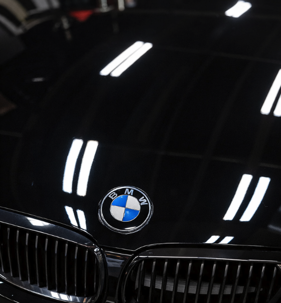 Before paint correction BMW hood swirl marks Colorado Springs