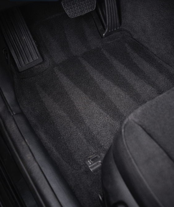 Driver floor carpet cleaned after interior detailing Colorado Springs