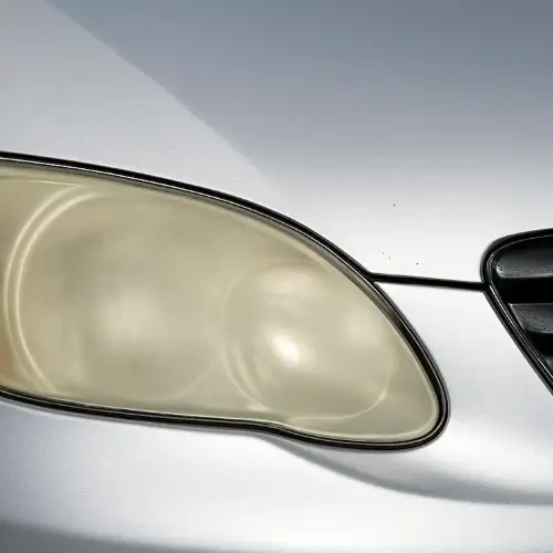 Cloudy, yellowed, oxidized headlight before restoration, Colorado Springs