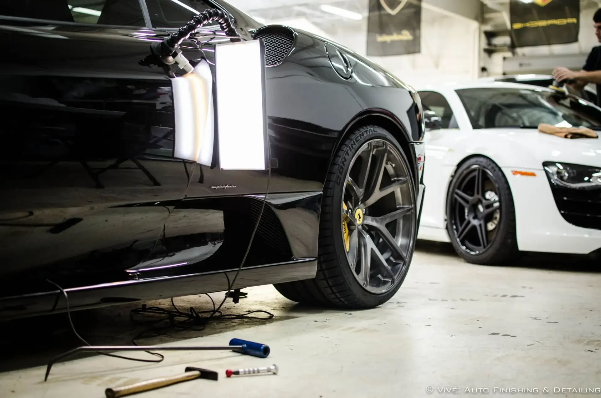 Paint correction inspection under light