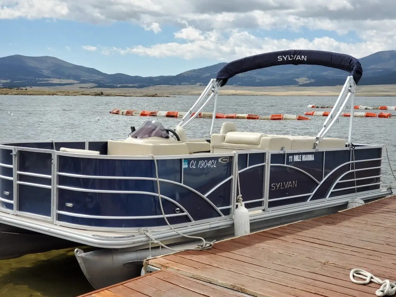 Ceramic-coated pontoon boat docked at 11 Mile Marina near Colorado Springs